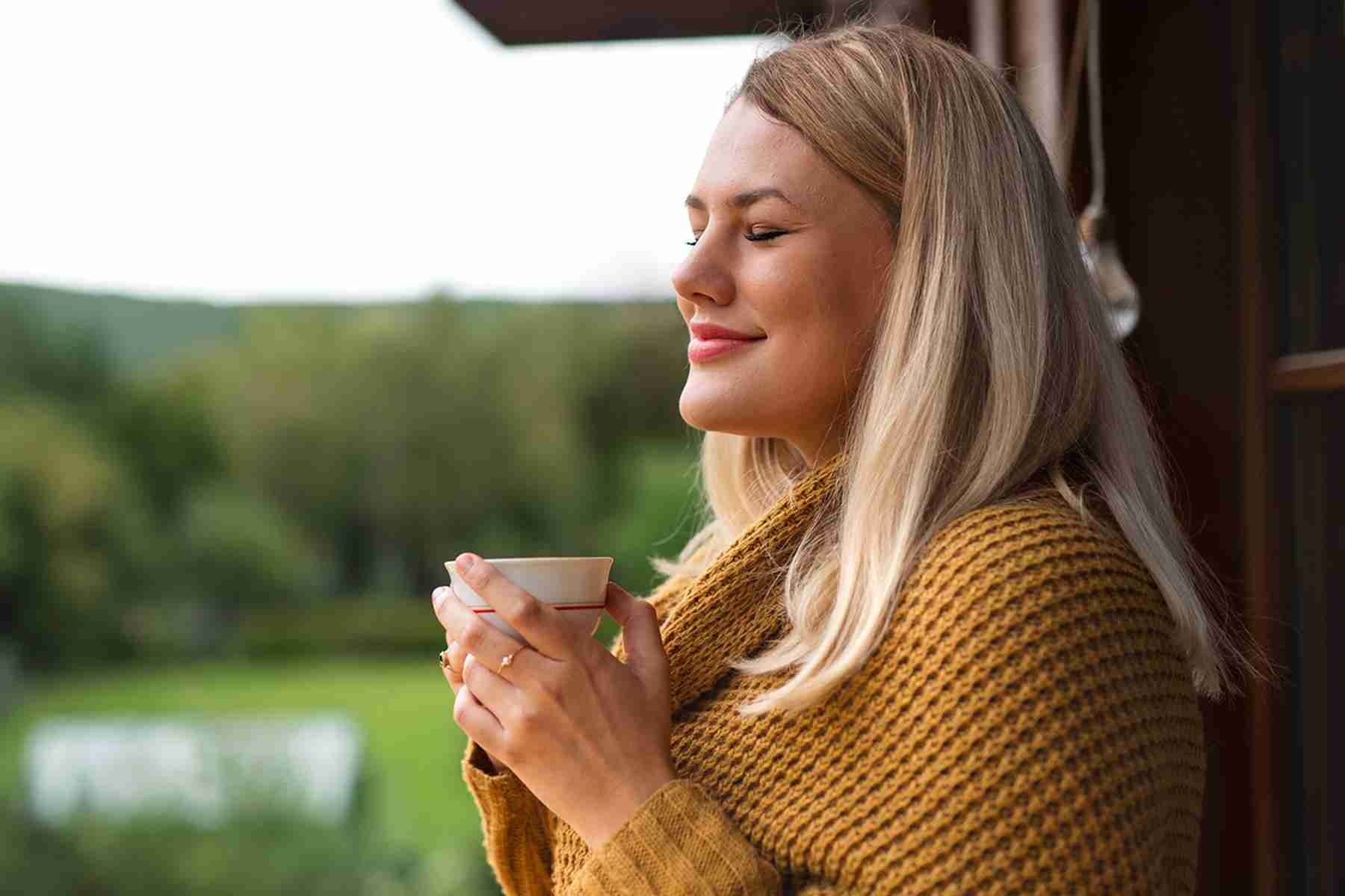 a woman drinking coffee