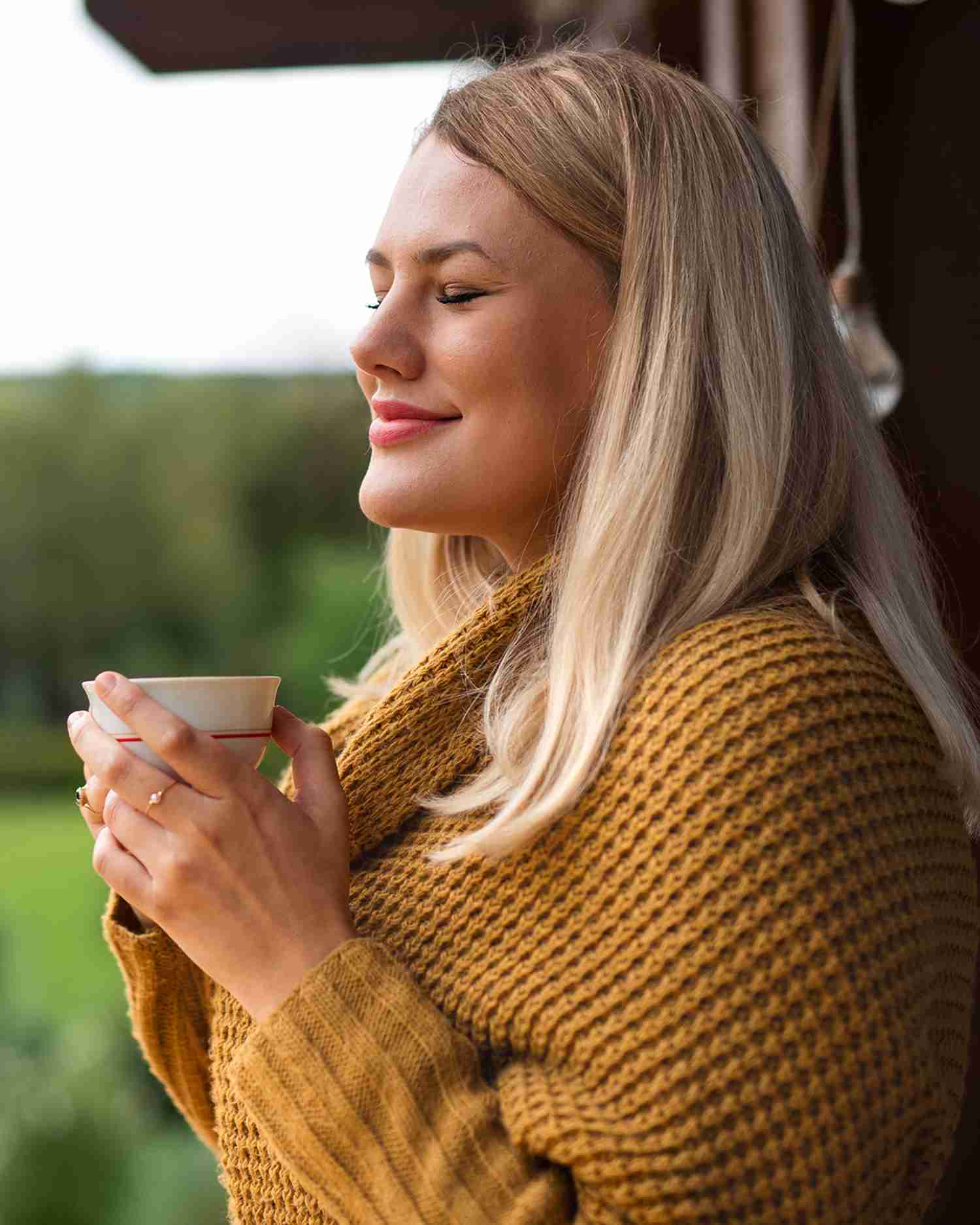 a woman drinking coffee