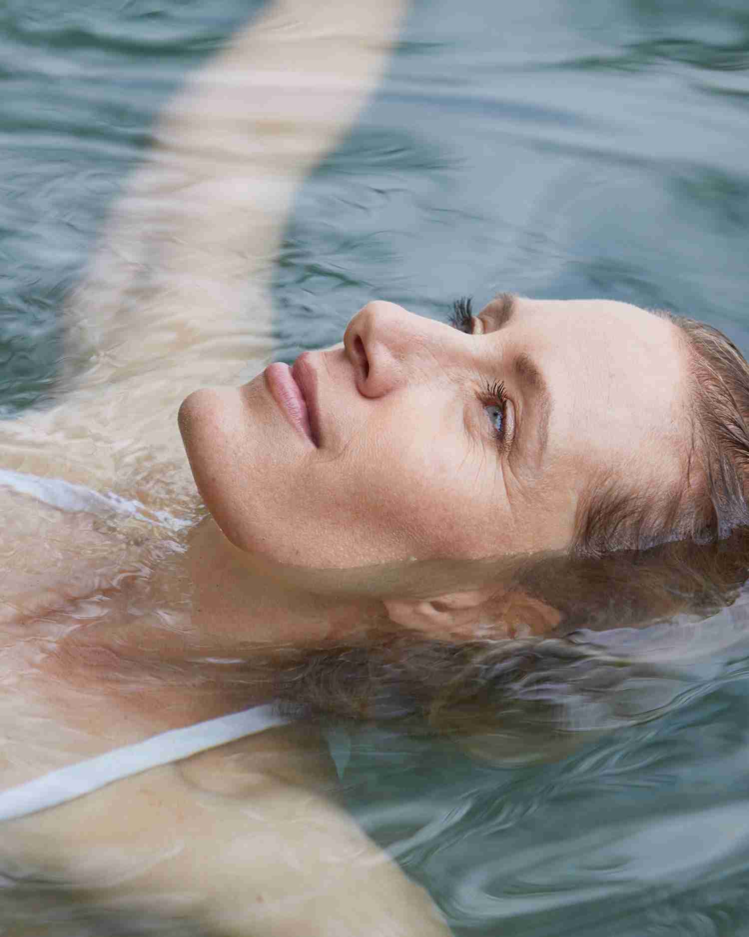 A woman floating on the water