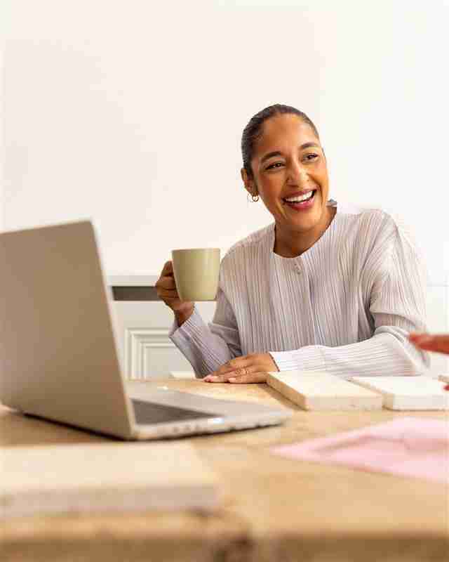 a woman drinking coffee