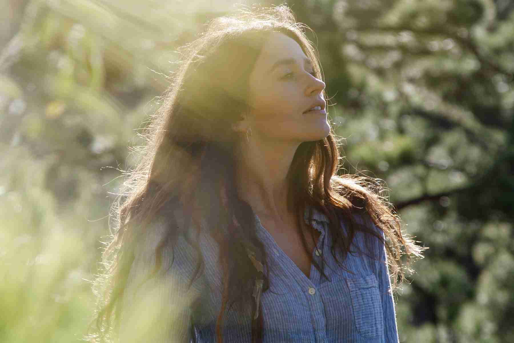 A woman smiling serenly