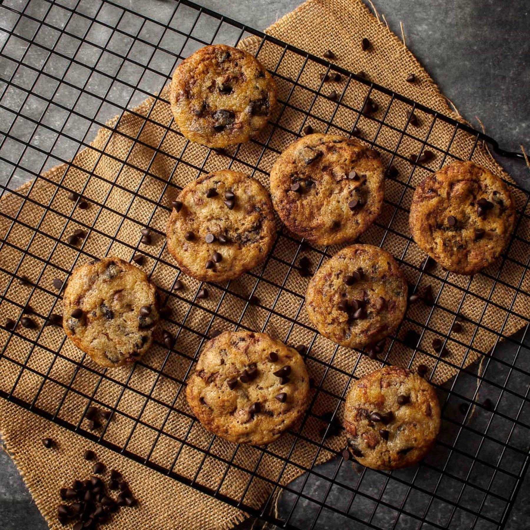 overhead view of chocolate chip cookies on cooling rack