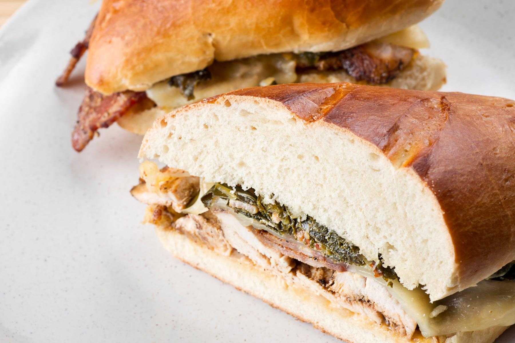 Close-up of toasted turkey muffuletta sandwich.