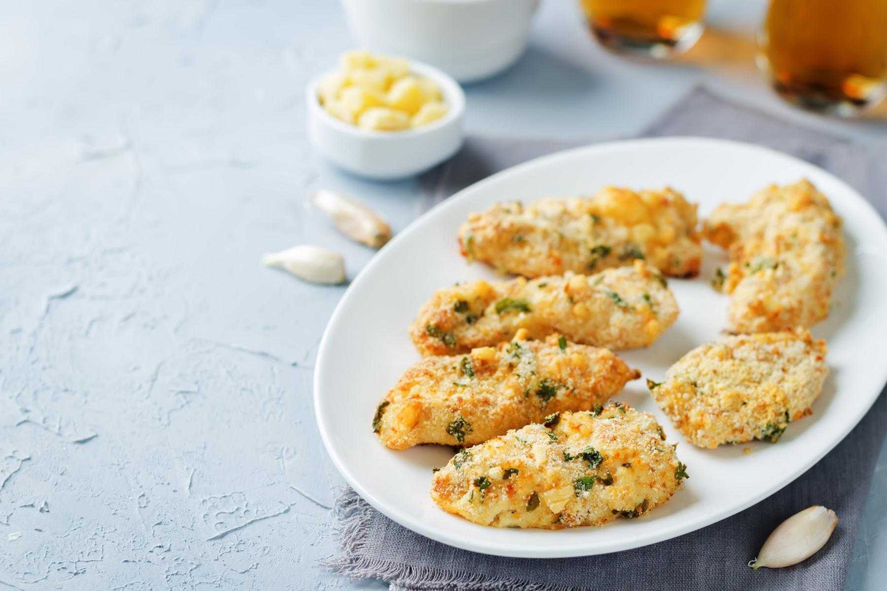 Plate of mustard crusted chicken.
