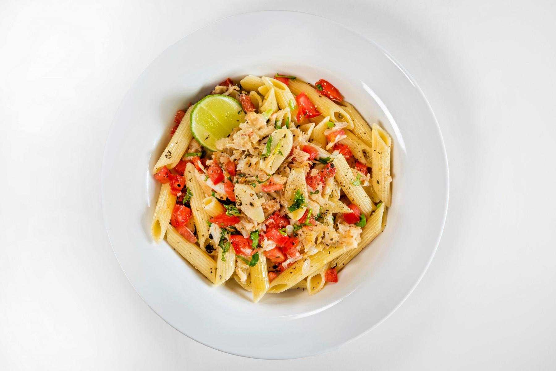 Overhead view of plate with crab pasta.