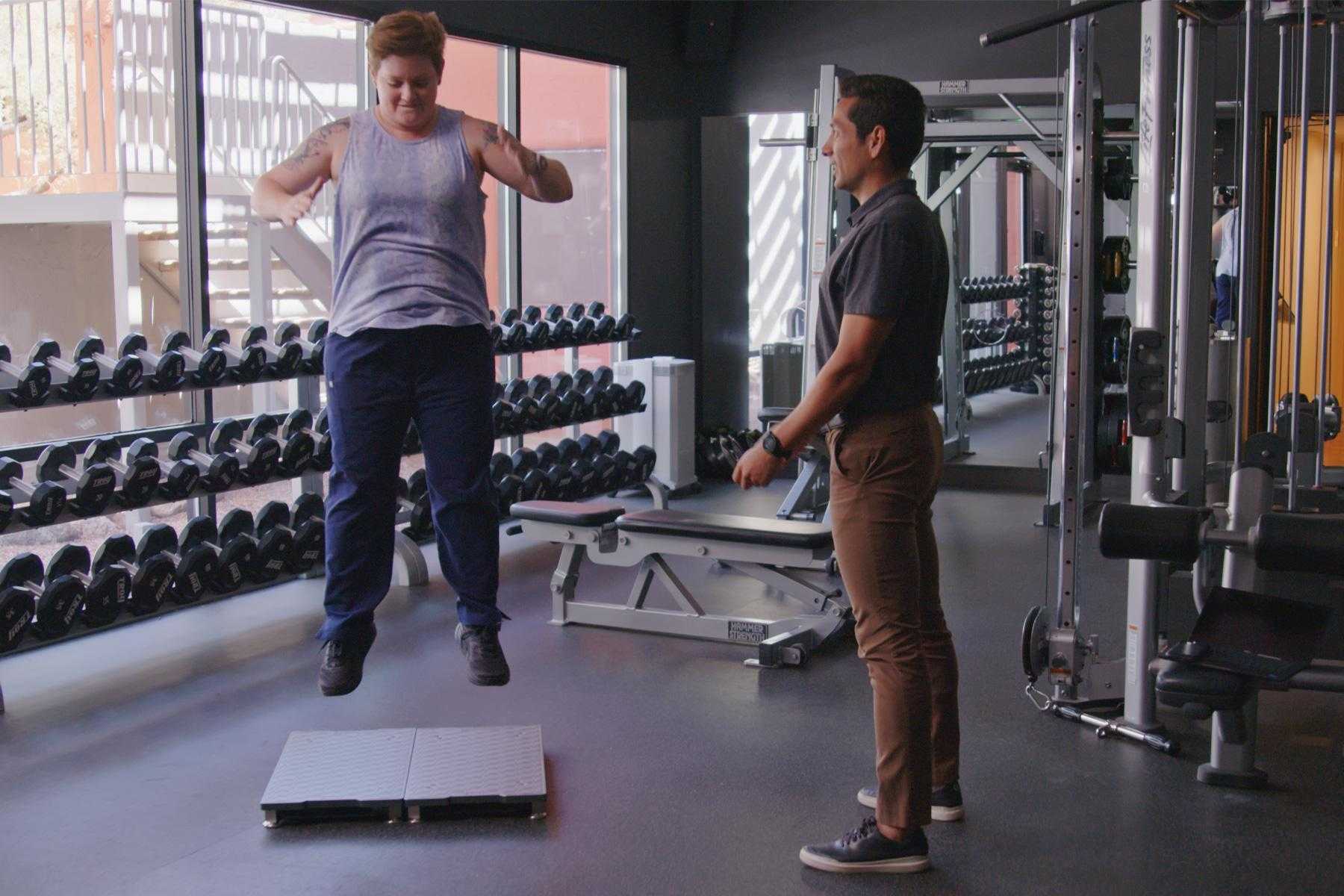 Image of Carlos Jimenez, DPT, SCS, CSCS, Director of Sports Medicine at Canyon Ranch Tucson, performing a jump training consultation at Canyon Ranch.