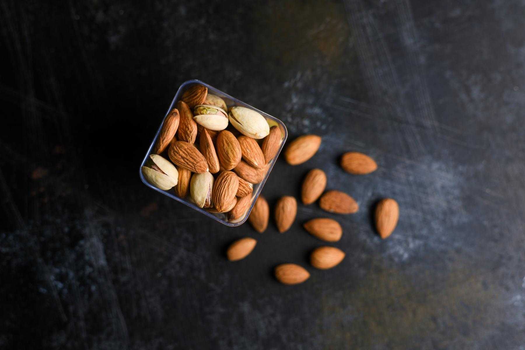 overhead image of a jar of almonds