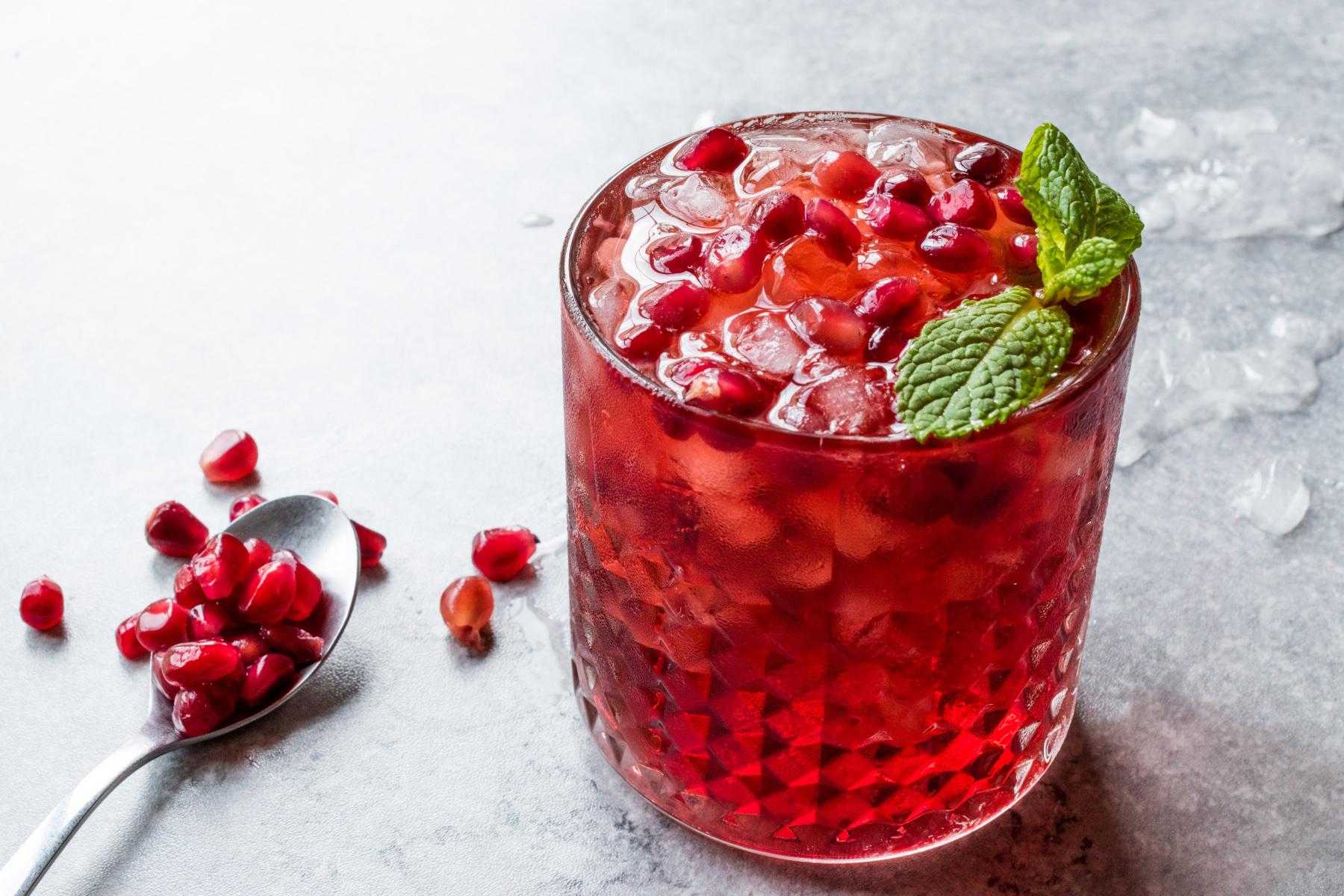 Pomegranate martini in glass.
