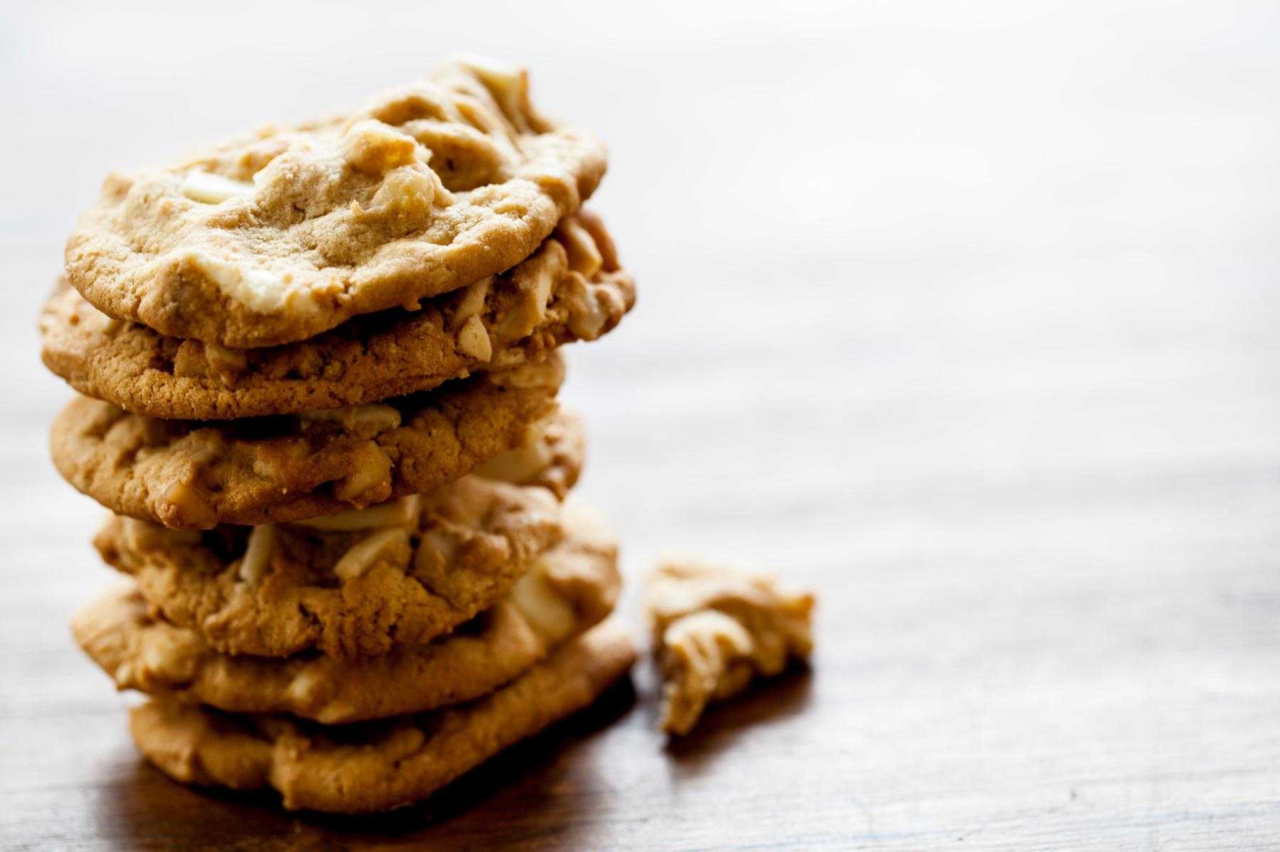 Stack of white chocolate macadamia cookies.
