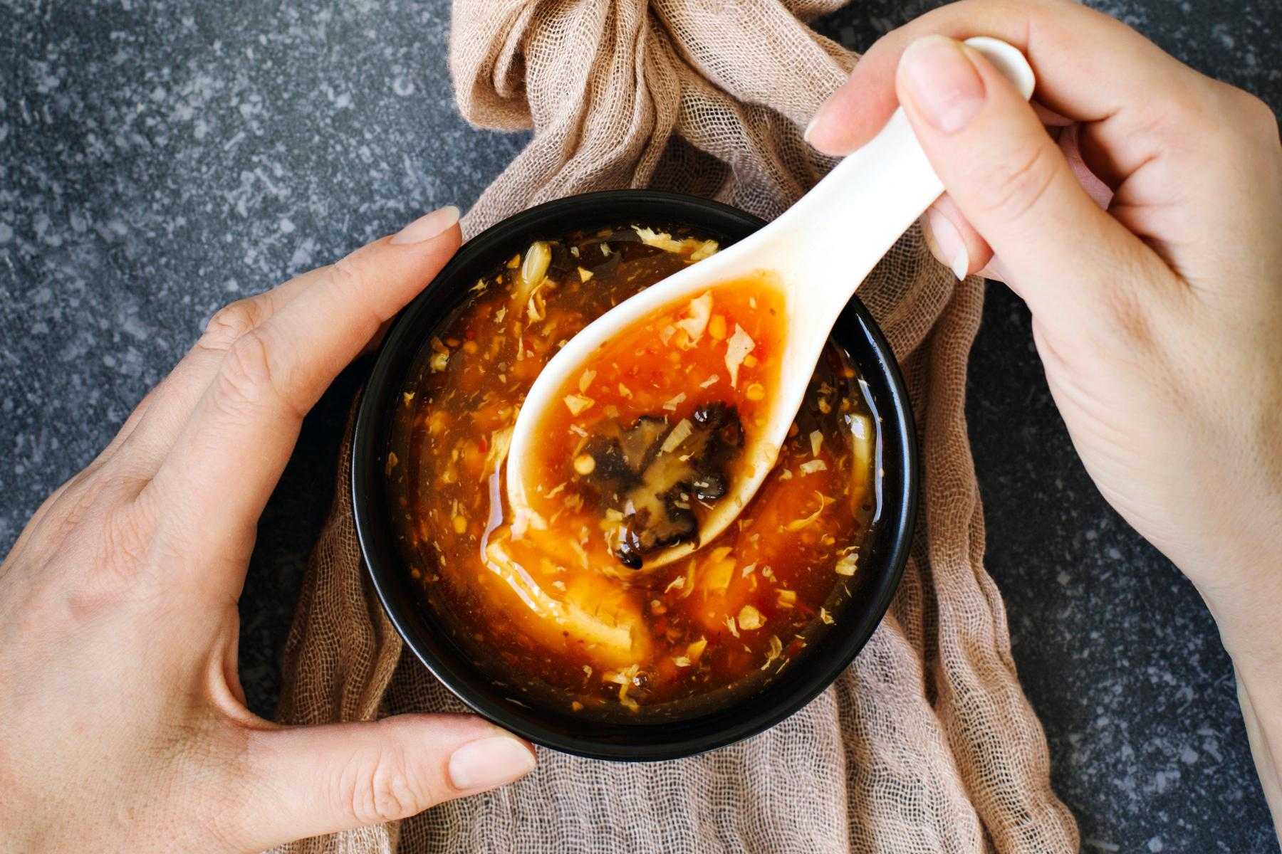 Overhead view of hot and sour soup.