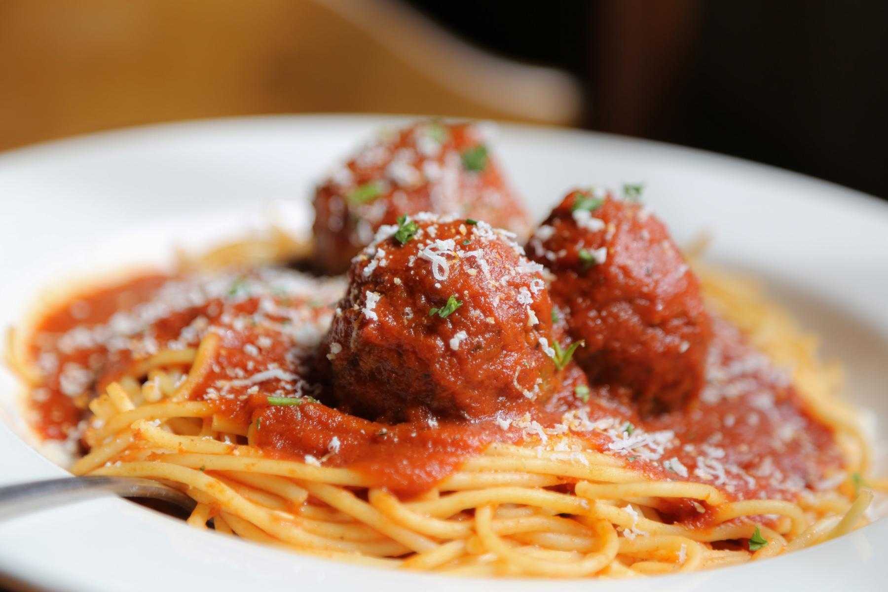 Close-up of a plate of spaghetti and meatballs.