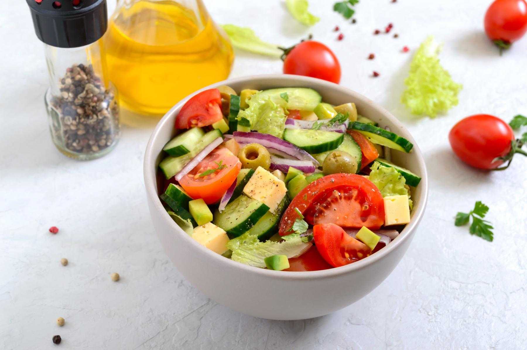 Overhead view of a bowl of mediterranean chopped salad.