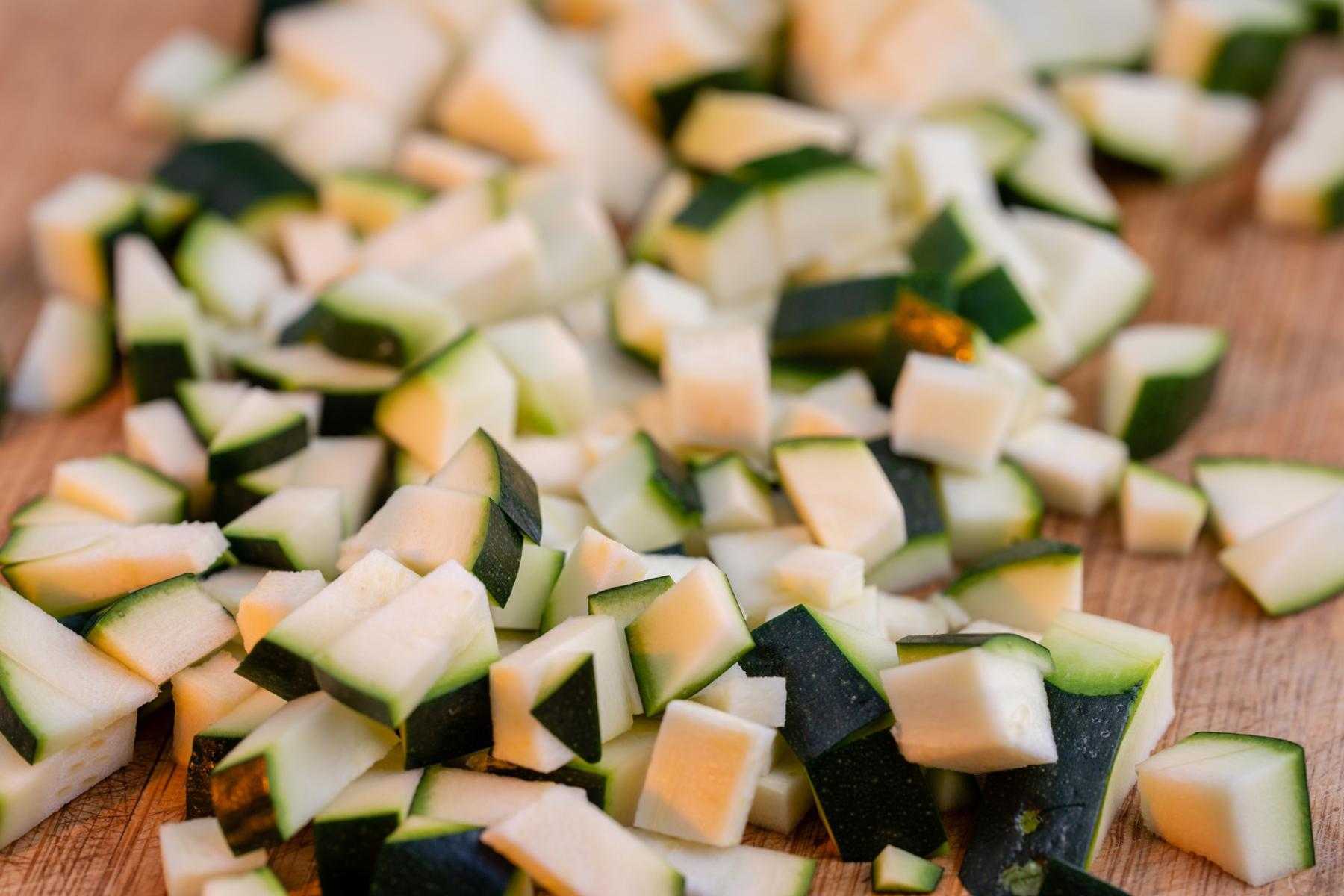 Close-up of a pile of chopped zucchini.