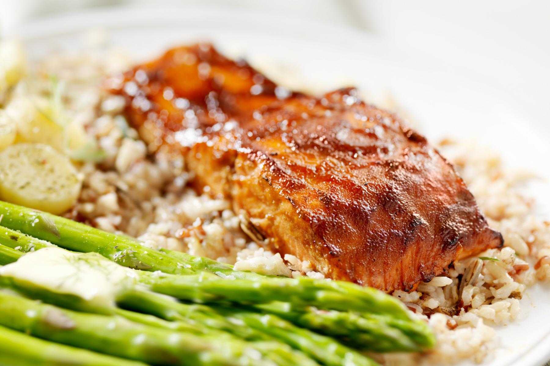 A plate of sautéed trout with orange anise glaze.
