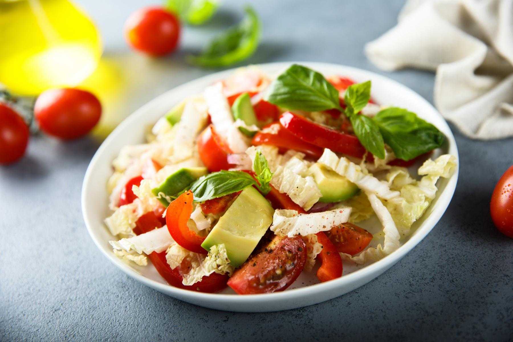A bowl of southwest roasted pepper and avocado salad.