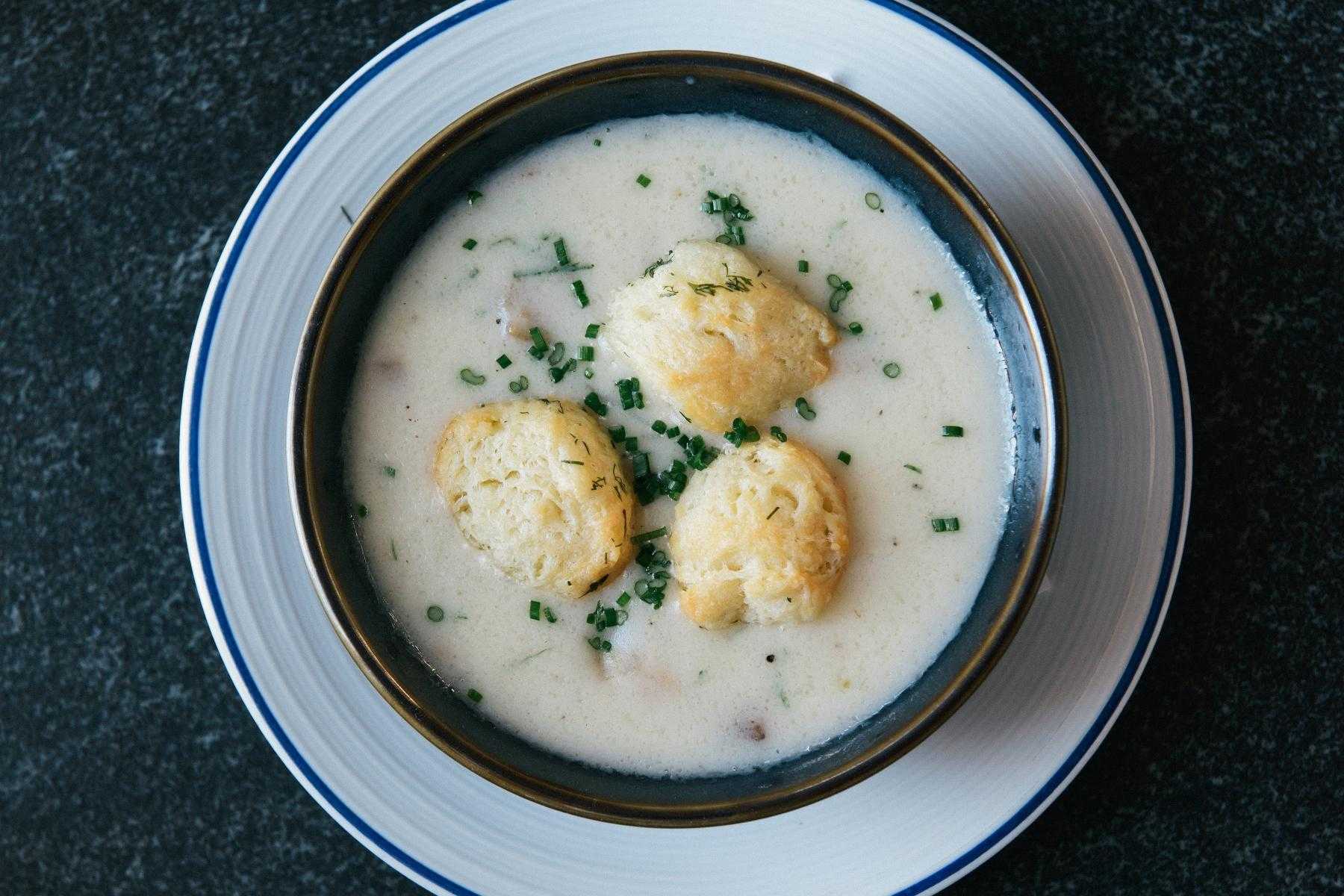 Overhead view of a  bowl of New England Clam Chowder.