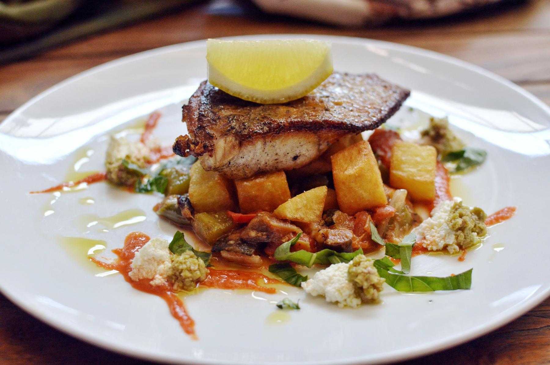 Plate of red curry crusted grouper.