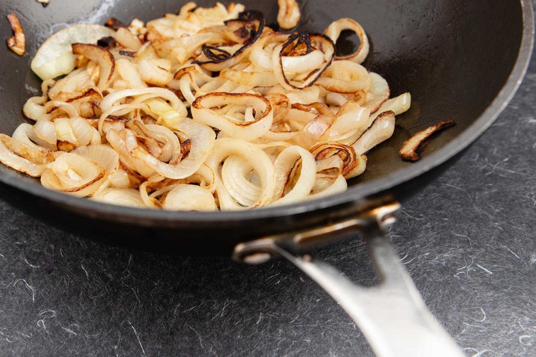 Onions in frying pan.