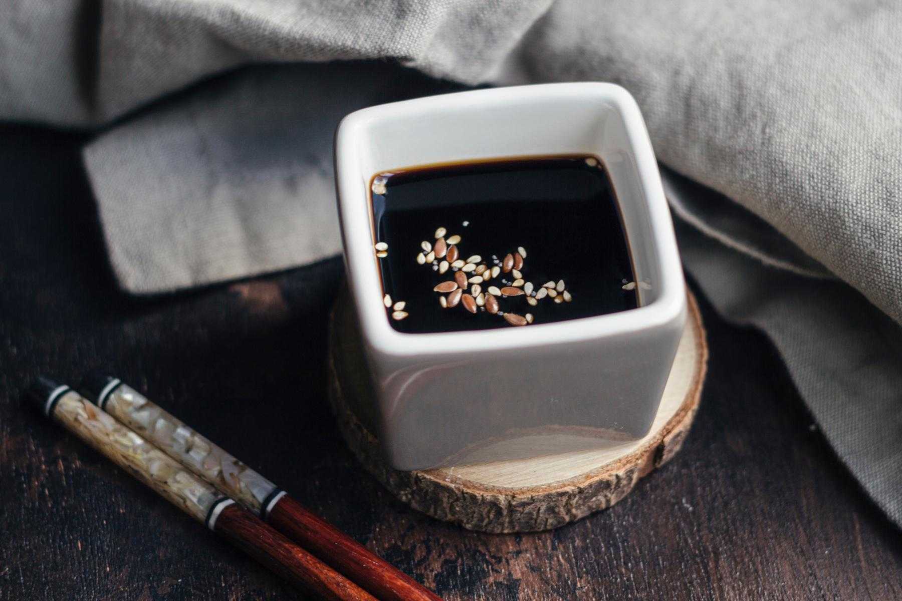 Soy sauce in dish.