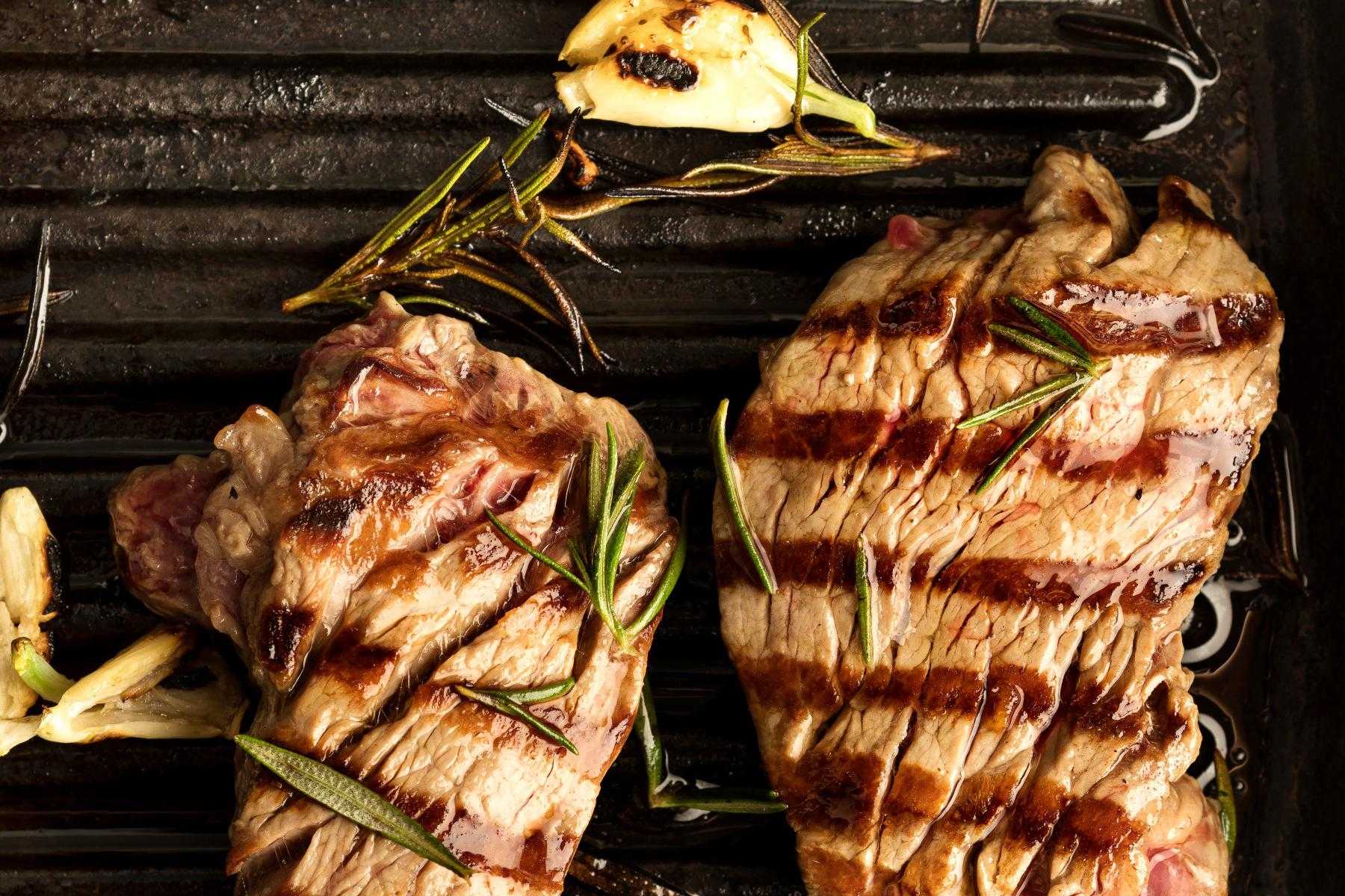 Lamb loin with herbs on top.