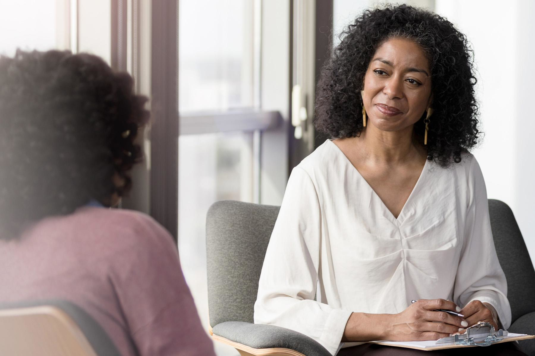 Two women having a conversation.