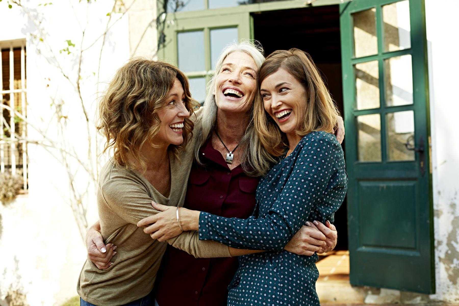 a group of women hugging