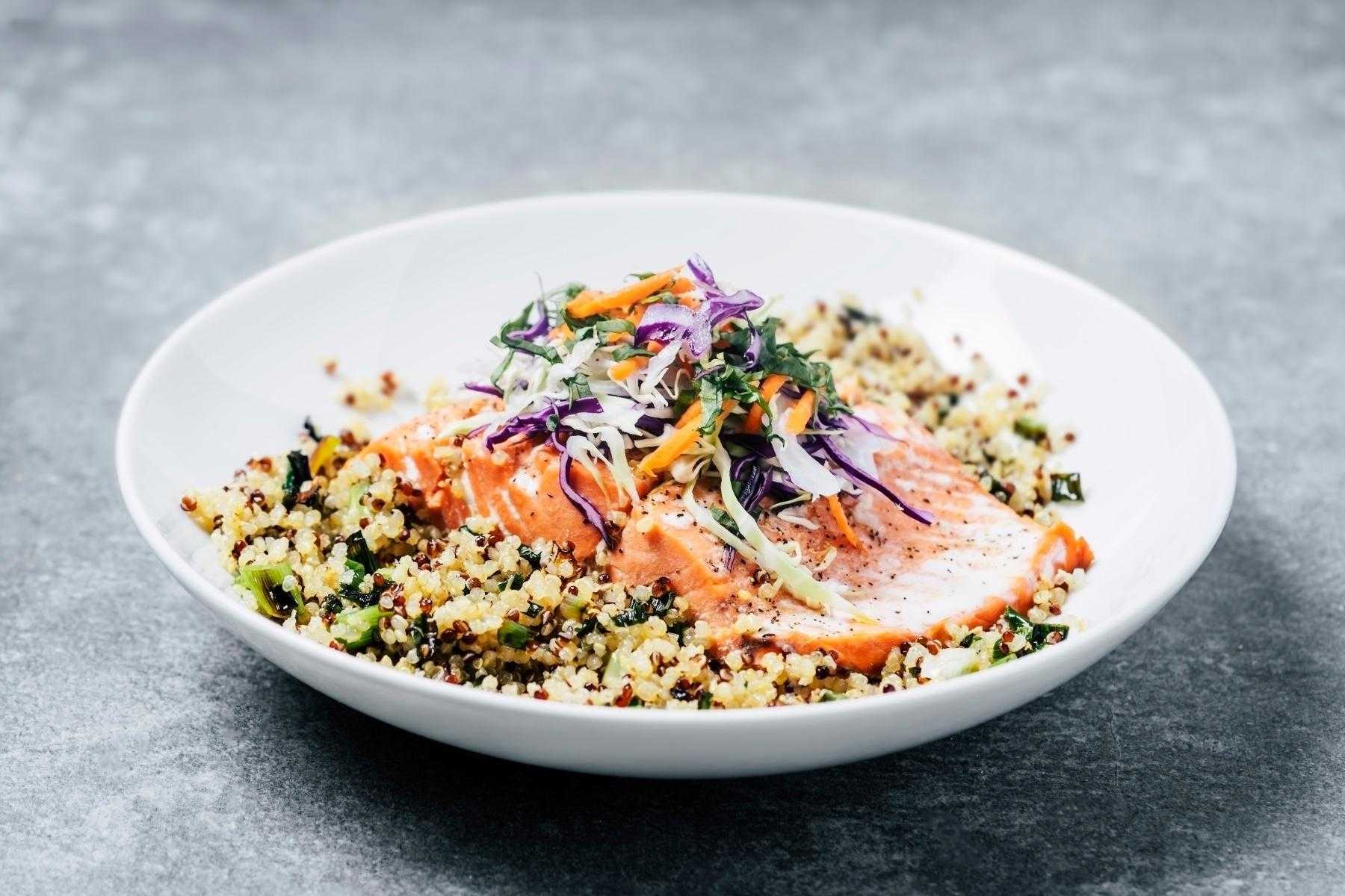 A plate of quinoa and fish.