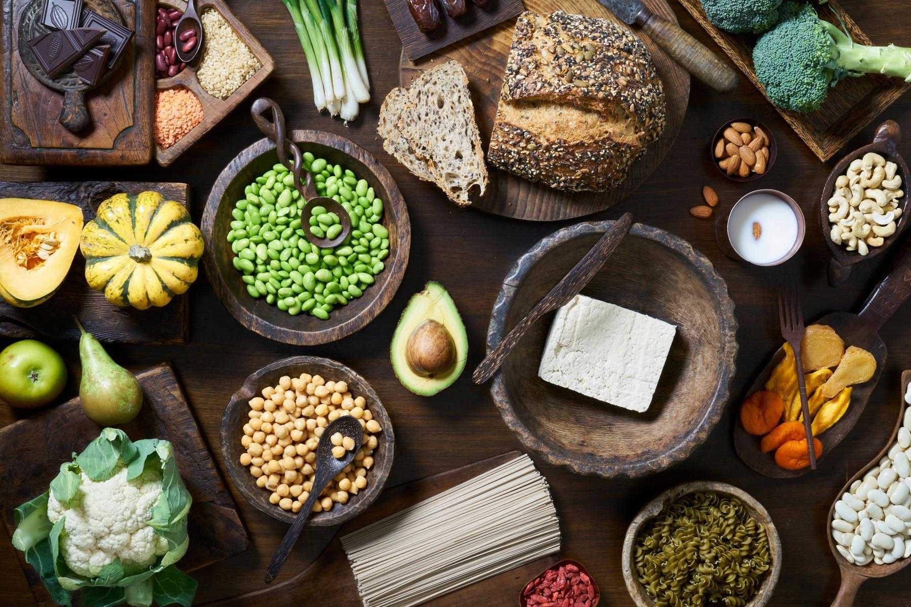 Overhead table shot of different types of cards such as bread and beans.