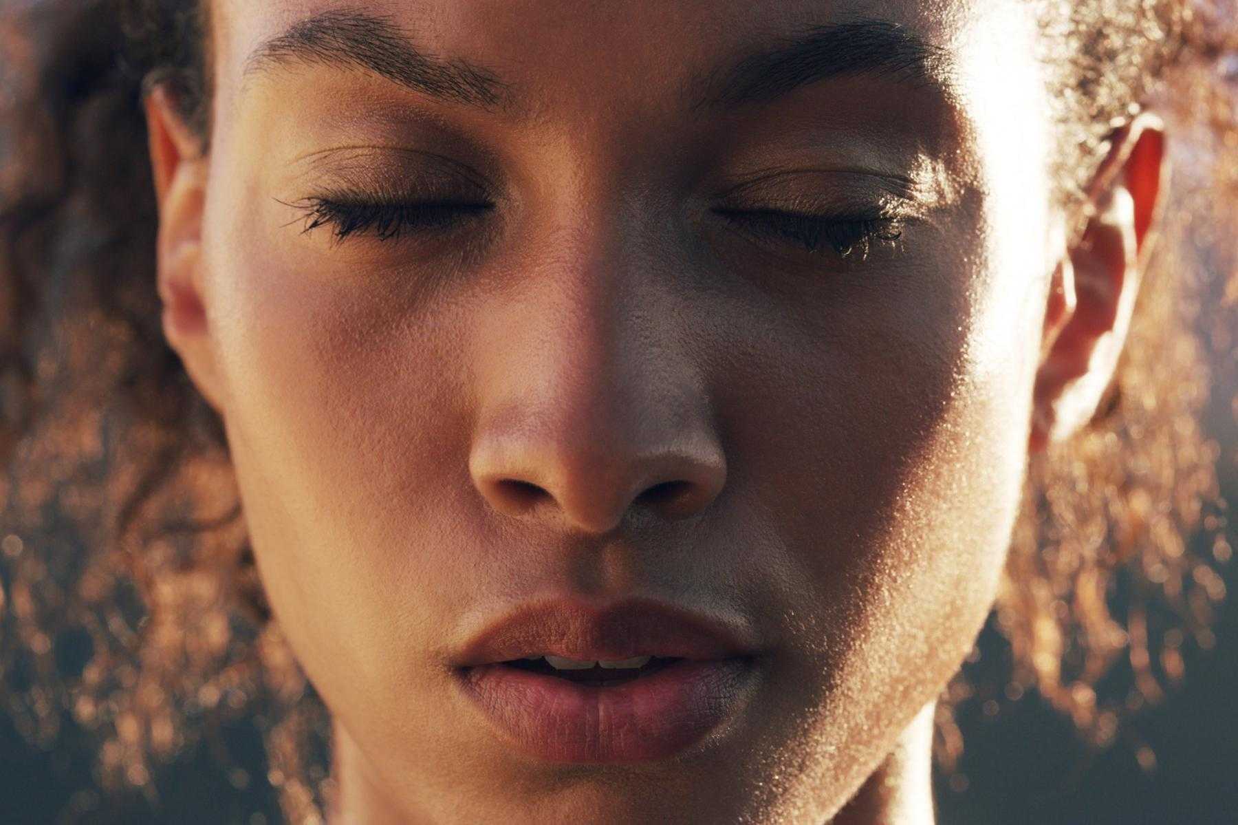 A close up of a young woman's face