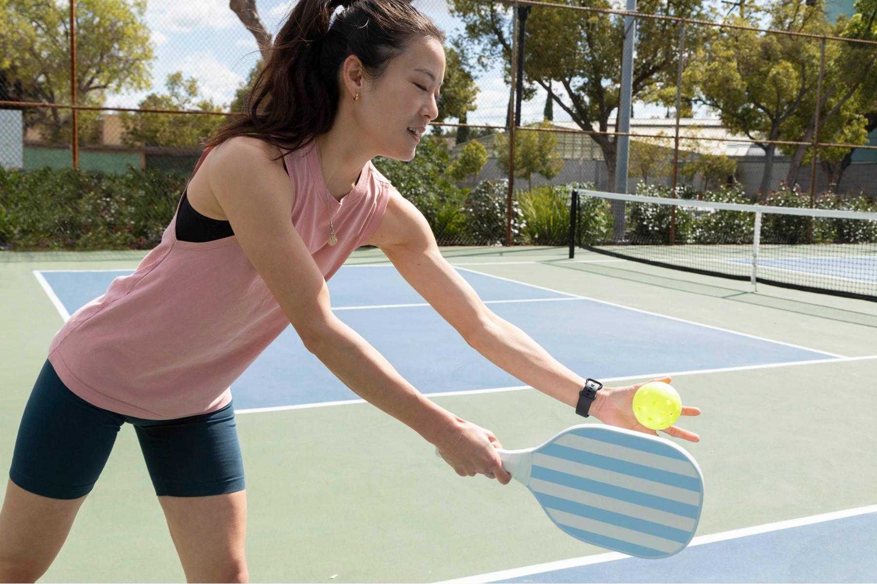 a group playing pickleball on the outdoor courts at Canyon Ranch health spa resort