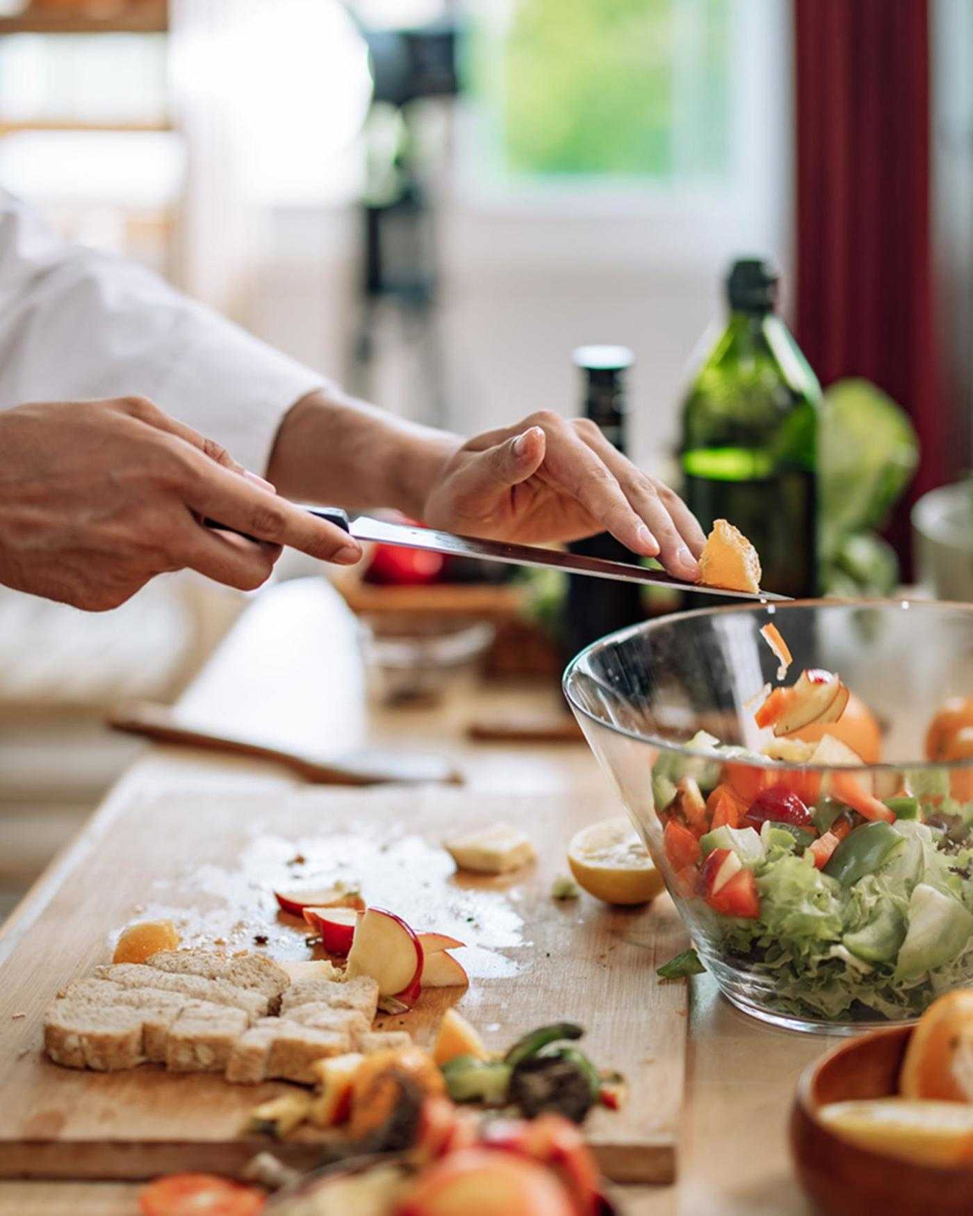A person cooking a healthy meal