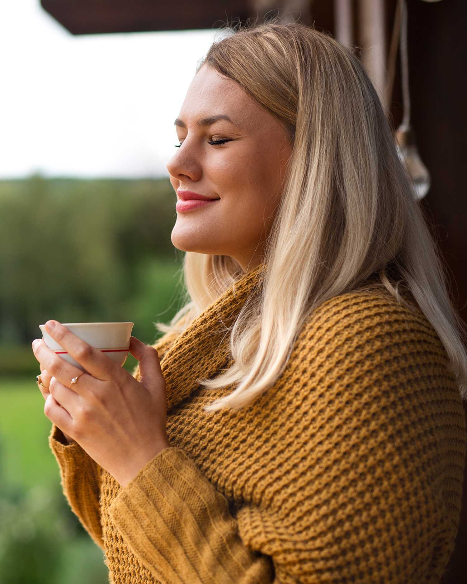 a woman drinking coffee