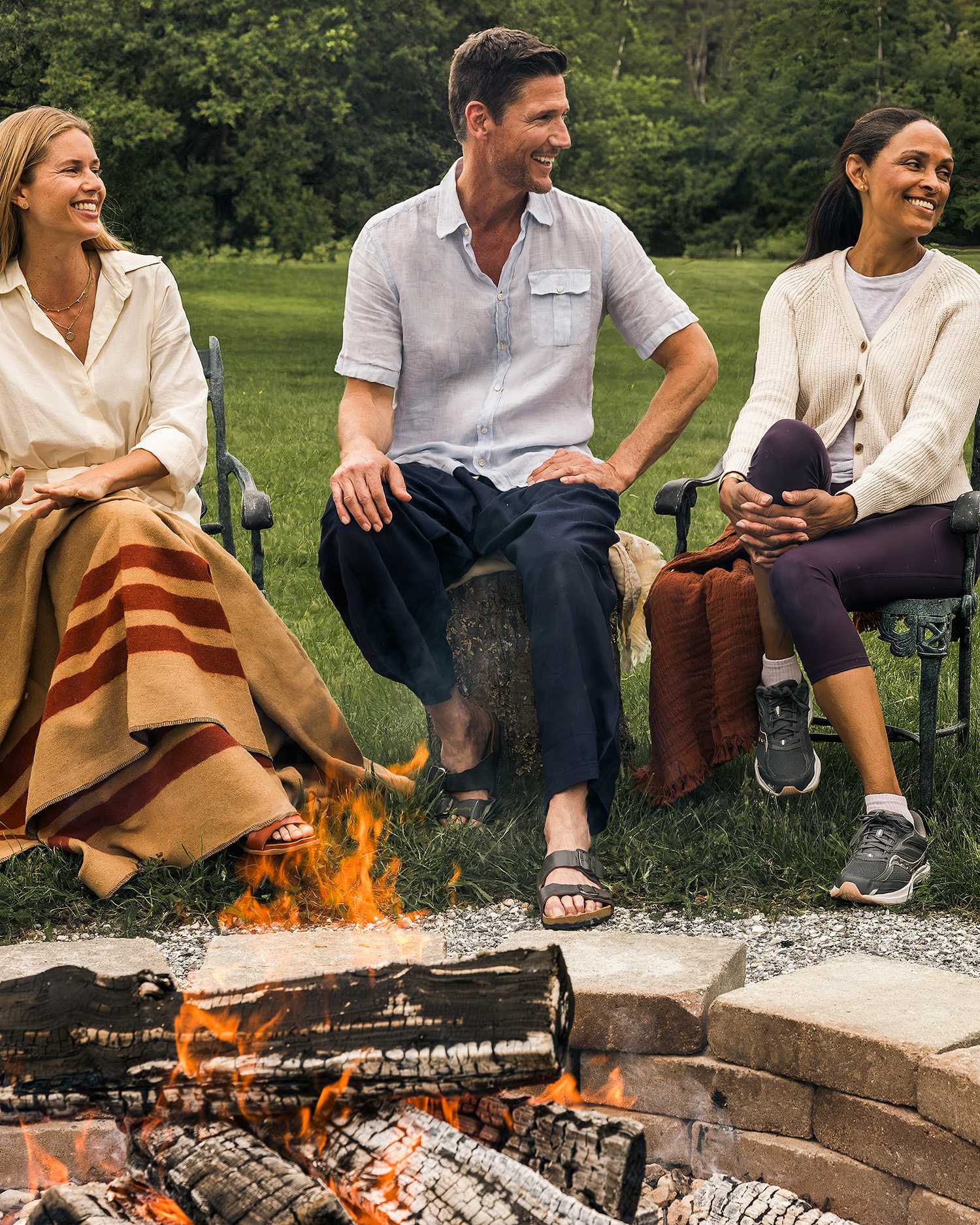 a group sitting at the campfire at Canyon Ranch Lenox