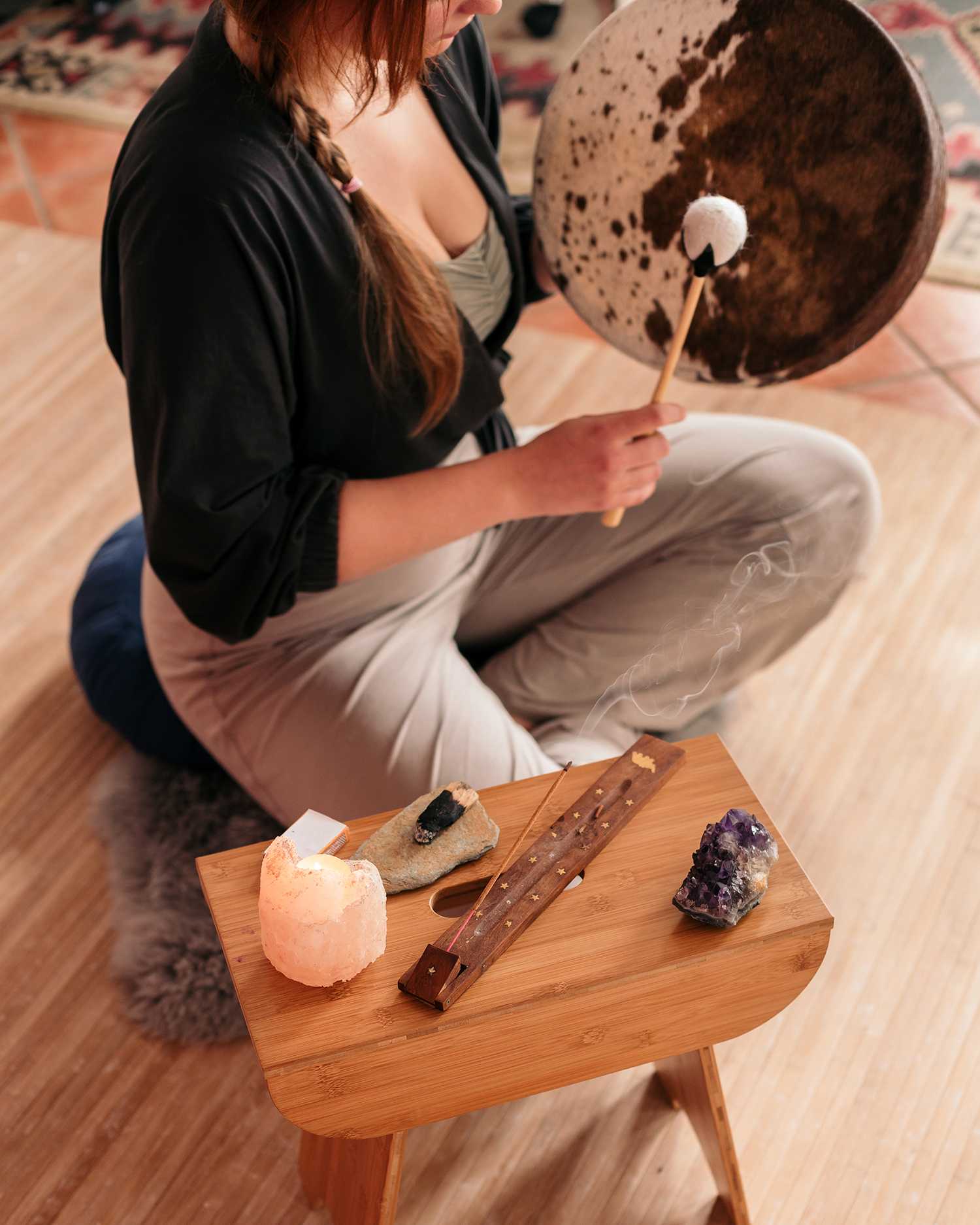 a woman ringing a gong