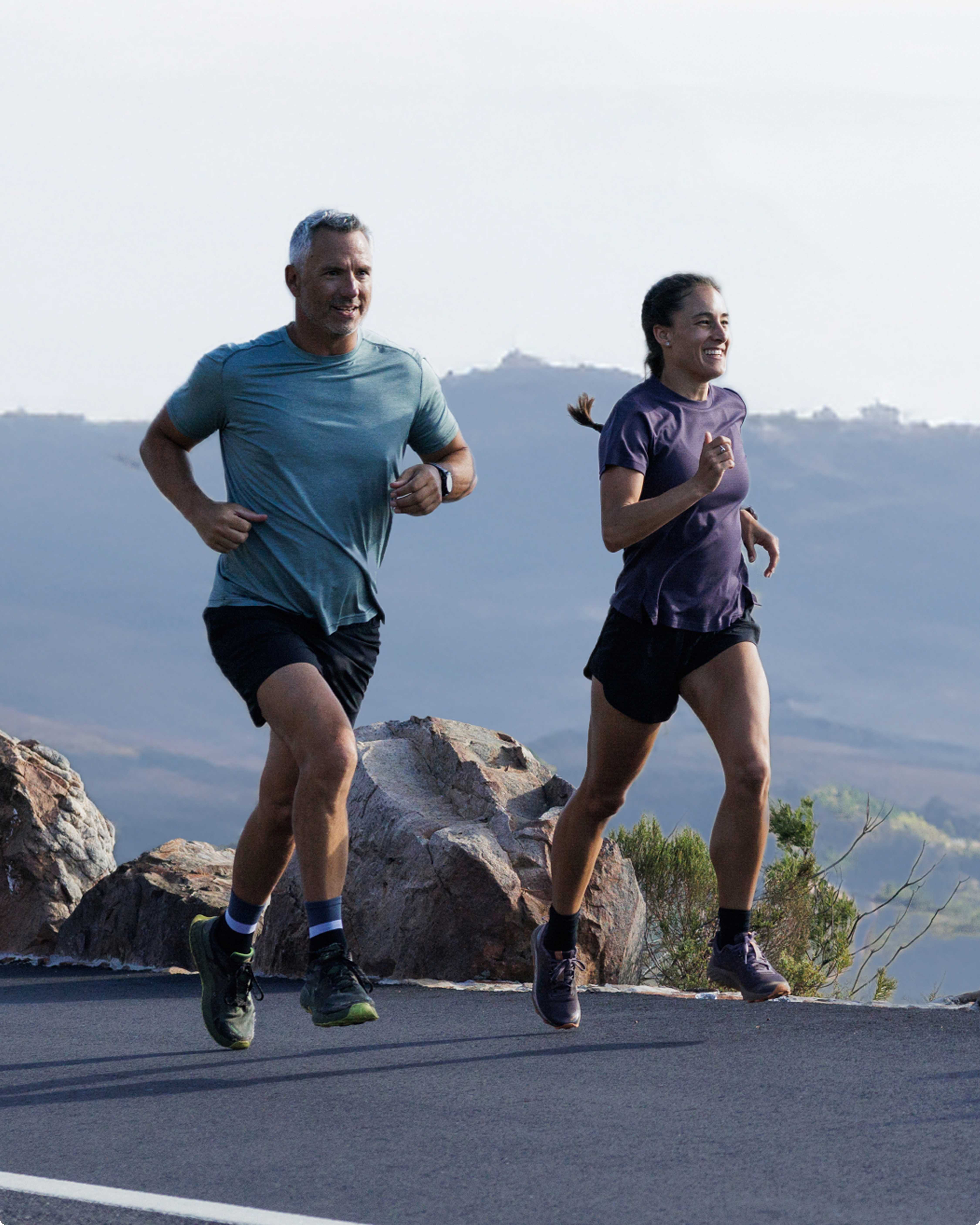 a fit older couple running