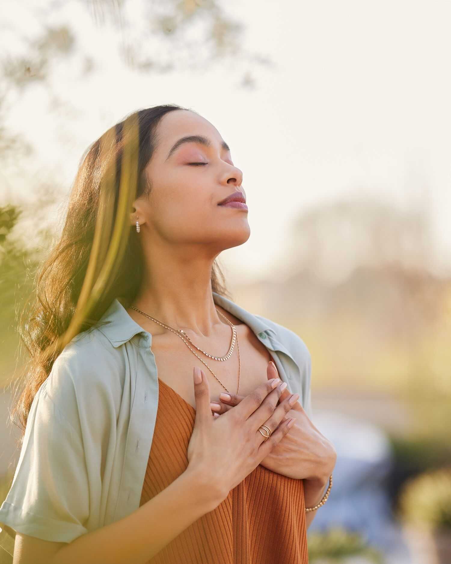 Woman Meditating Outdoors 