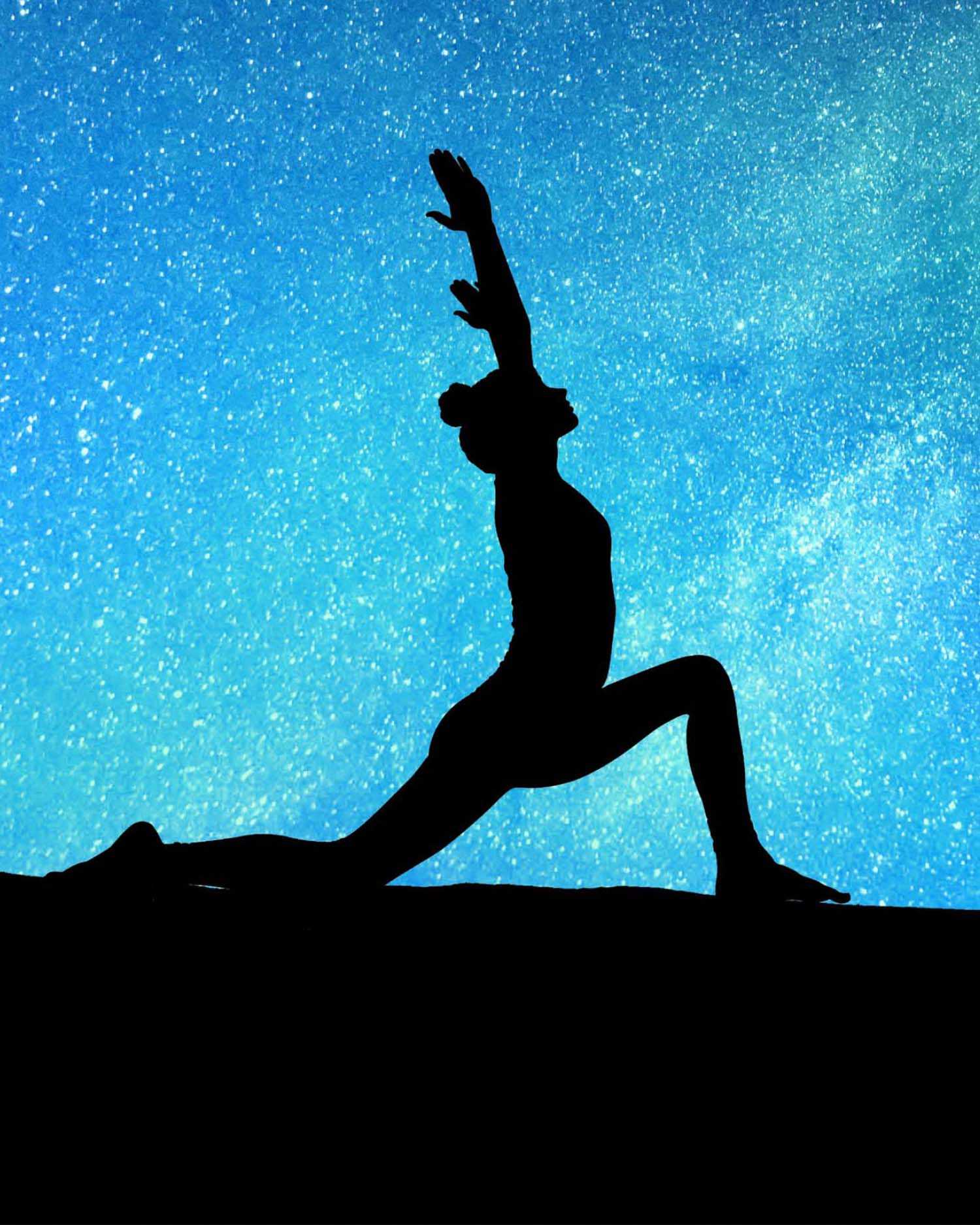 a woman doing yoga under the stars