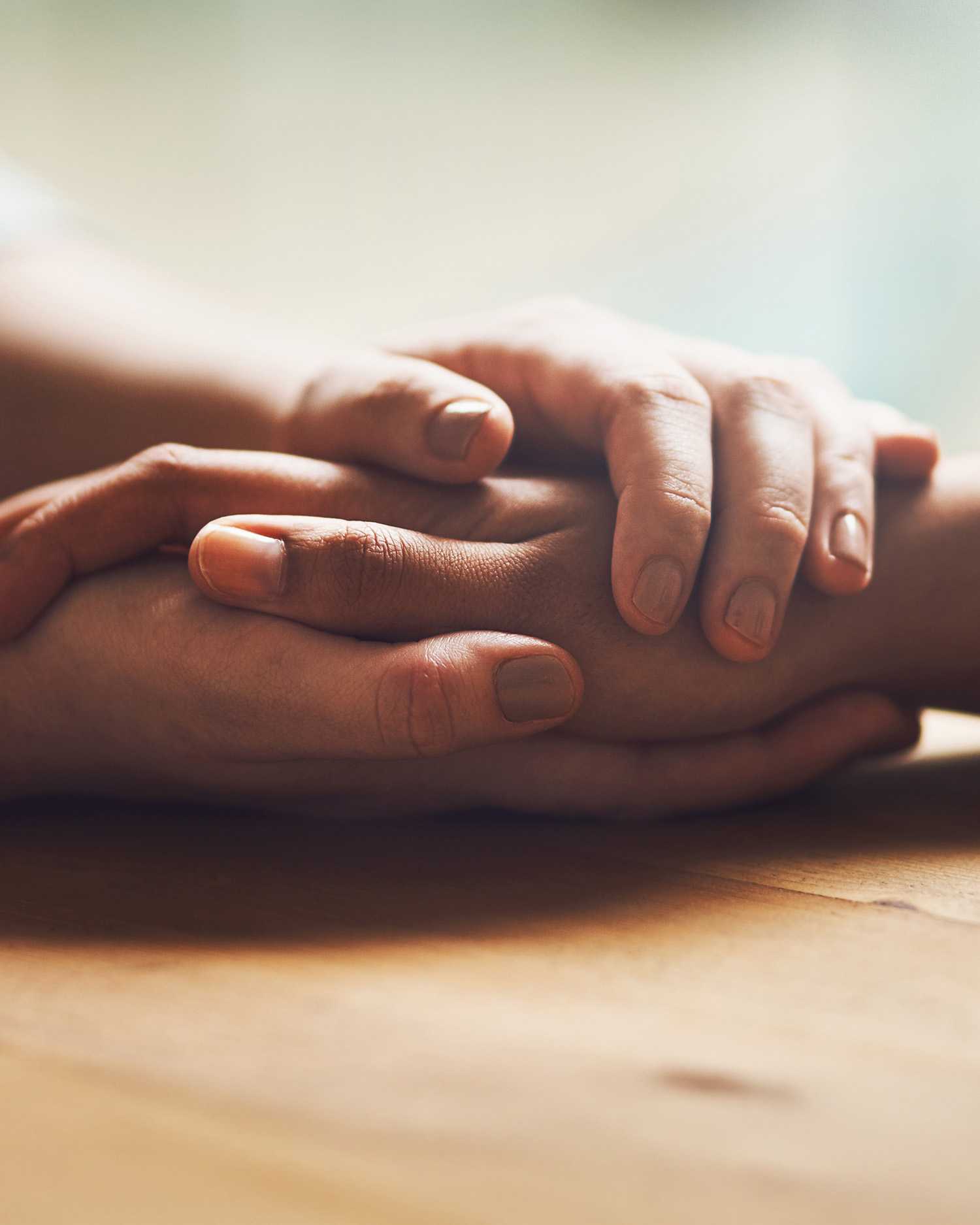 two people holding hands