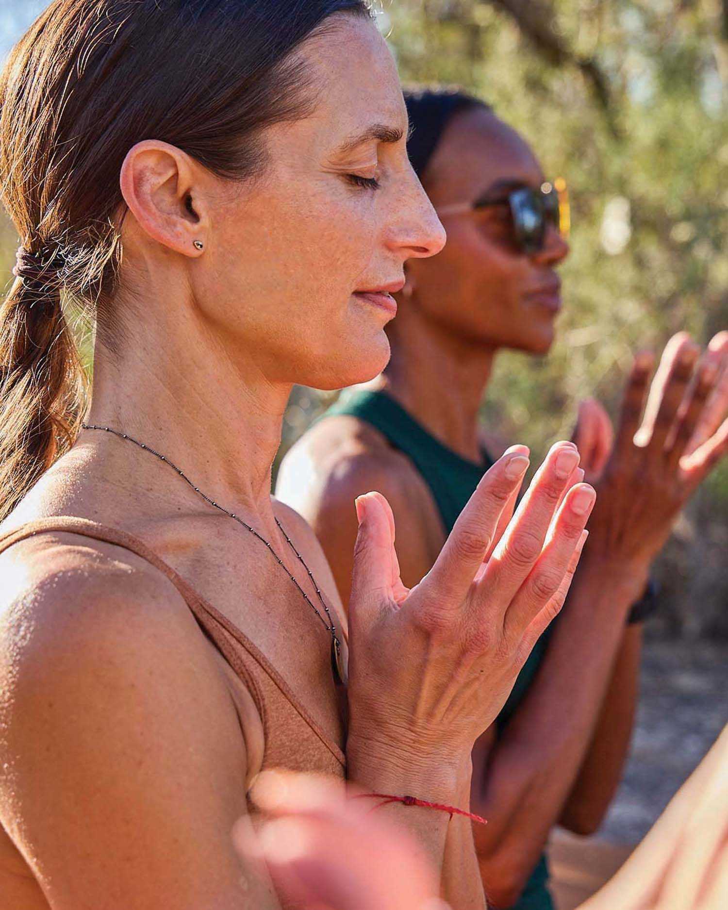 a group of women meditating