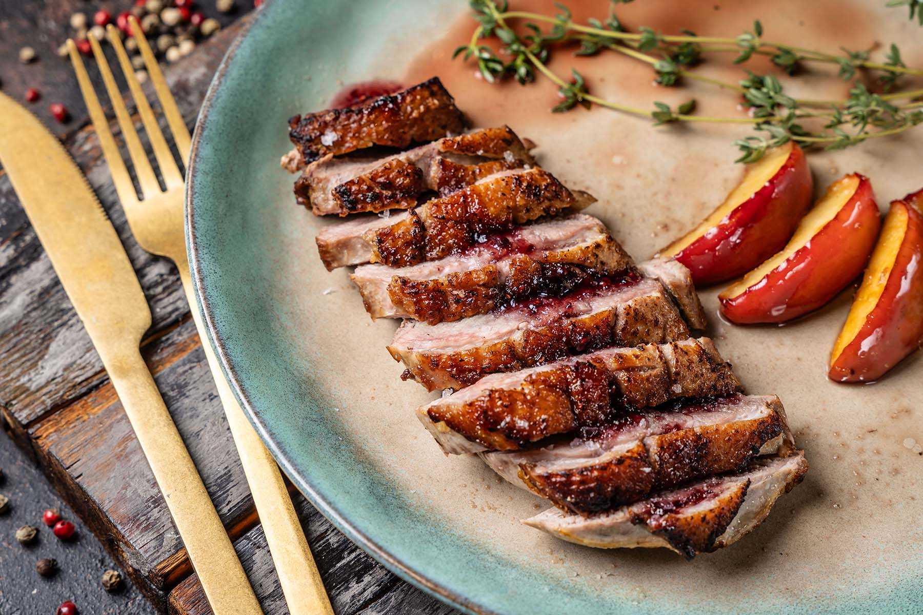 a plate of Seared Duck Breast with Pomegranate Bordelaise at Canyon Ranch