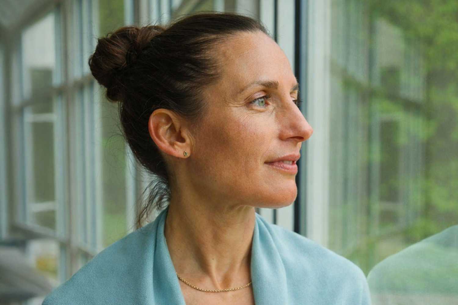 A woman looking out the window