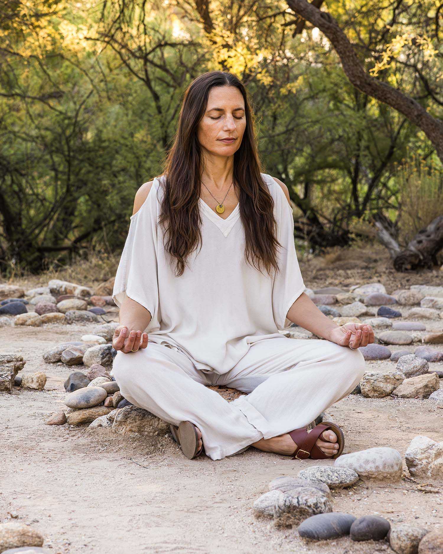 a woman meditating at Canyon Ranch Tucson