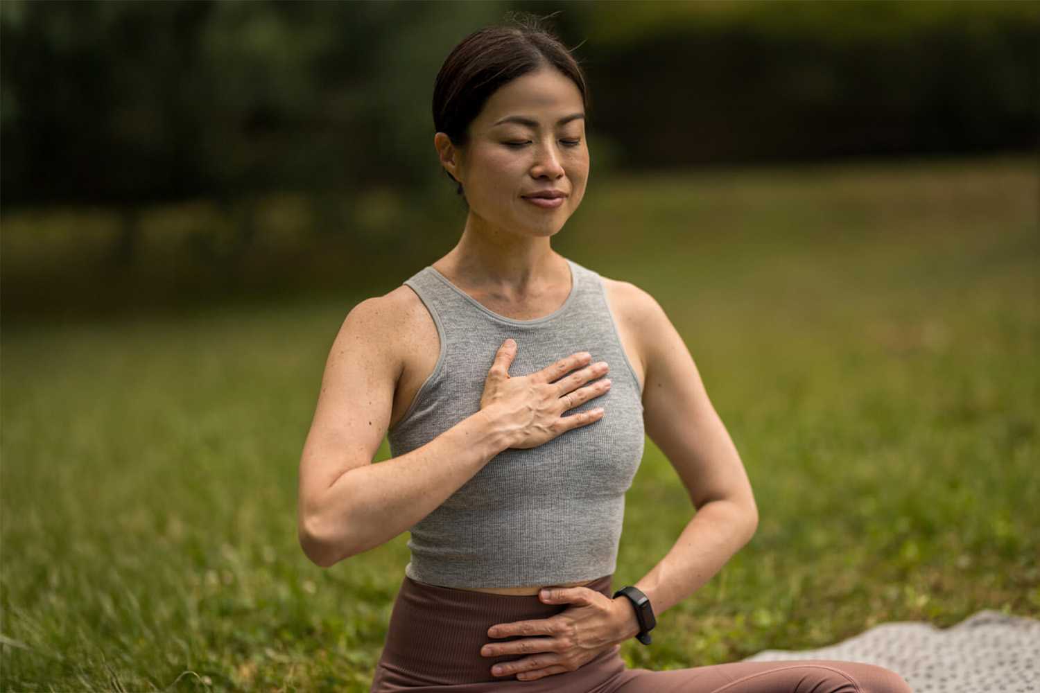 a woman meditating through breathwork at Canyon Ranch Tucson