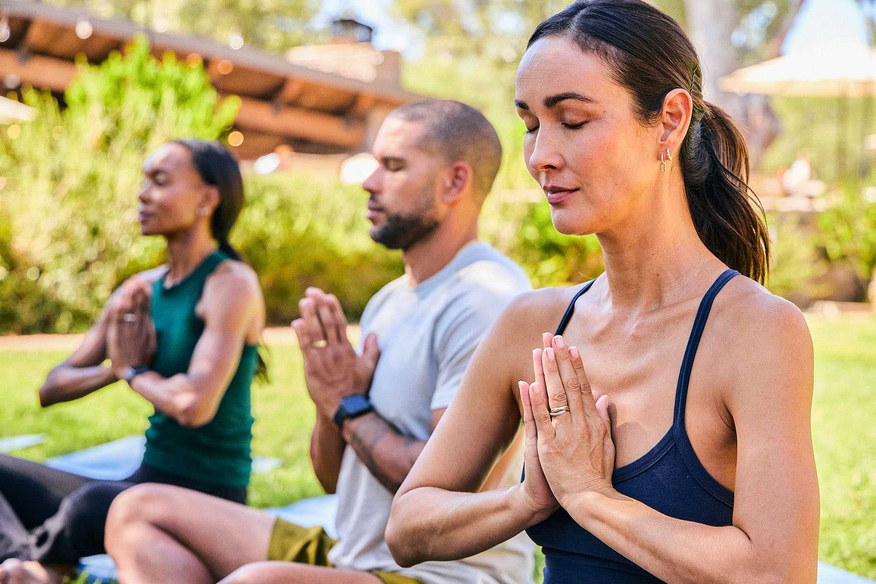 a group of people meditating