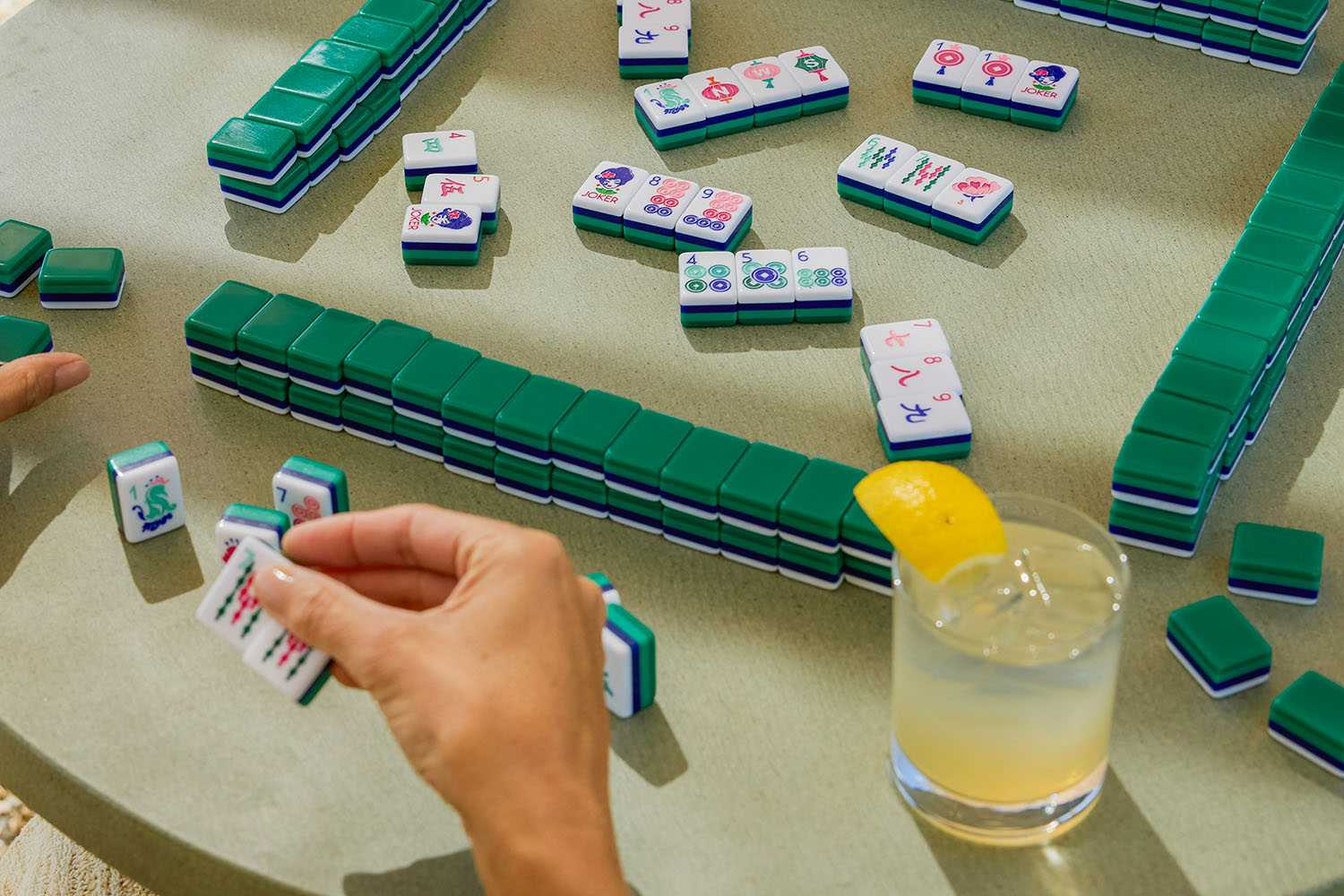 a table of people playing mahjong