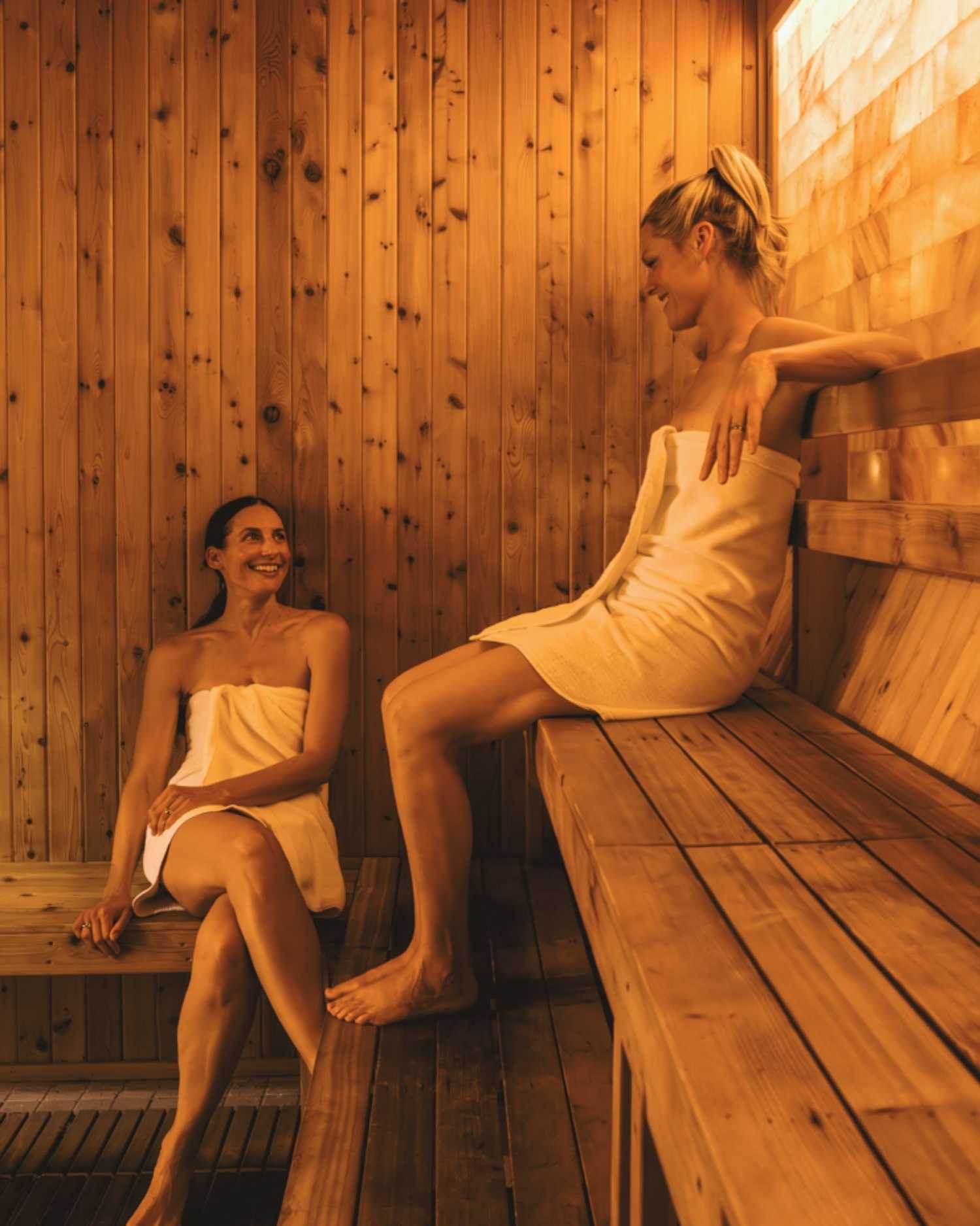 Two women in a salt wall sauna at Canyon Ranch