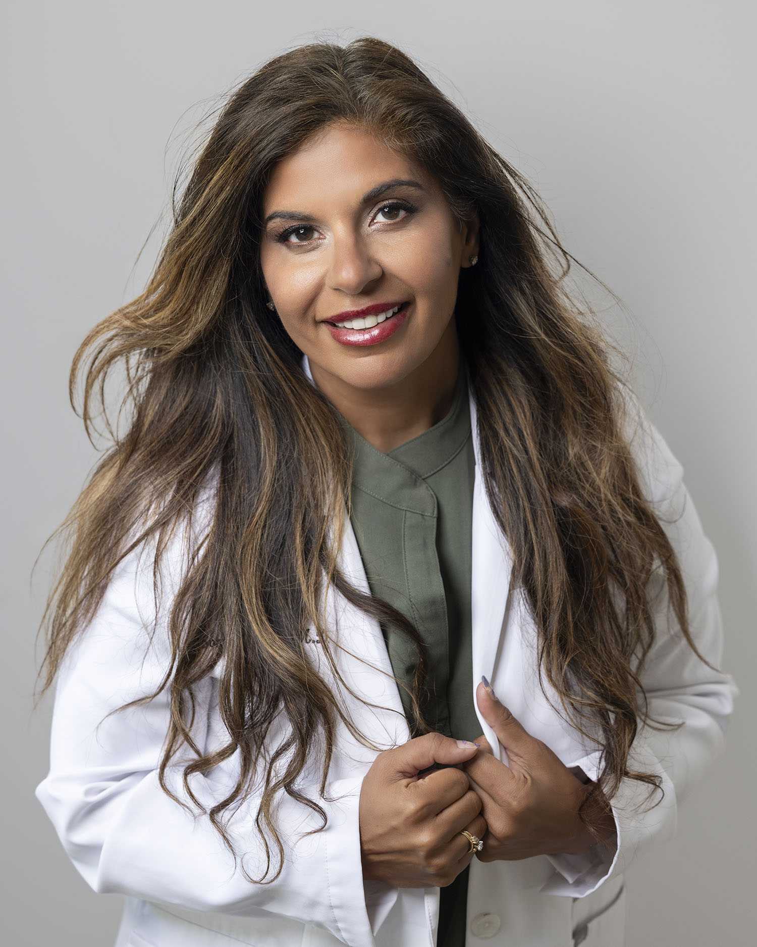 a woman floating in water with an overlay image of Dr. Somi