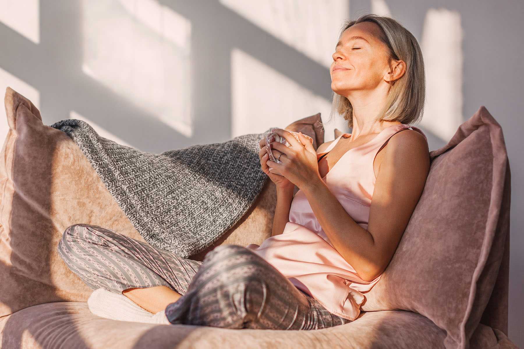 a woman sitting on a couch