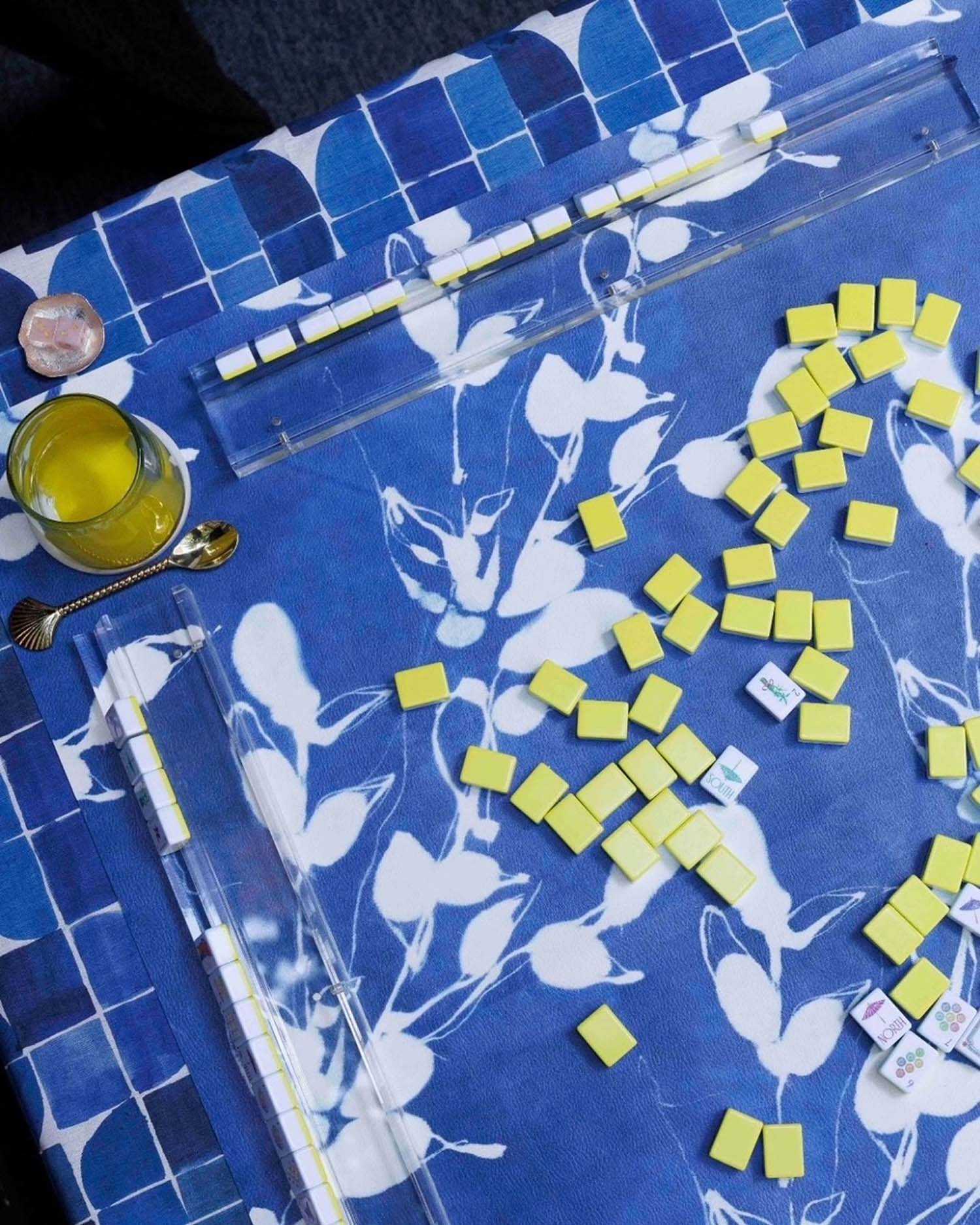 A table of people playing mahjong