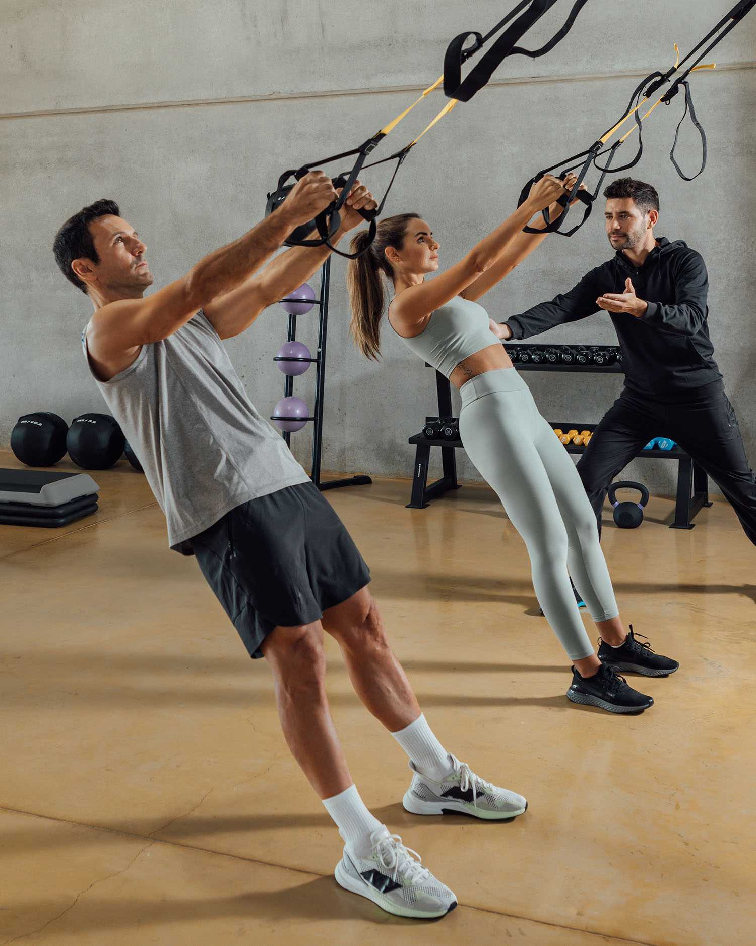 Man and Woman During a Strength Training Session with Personal Trainer